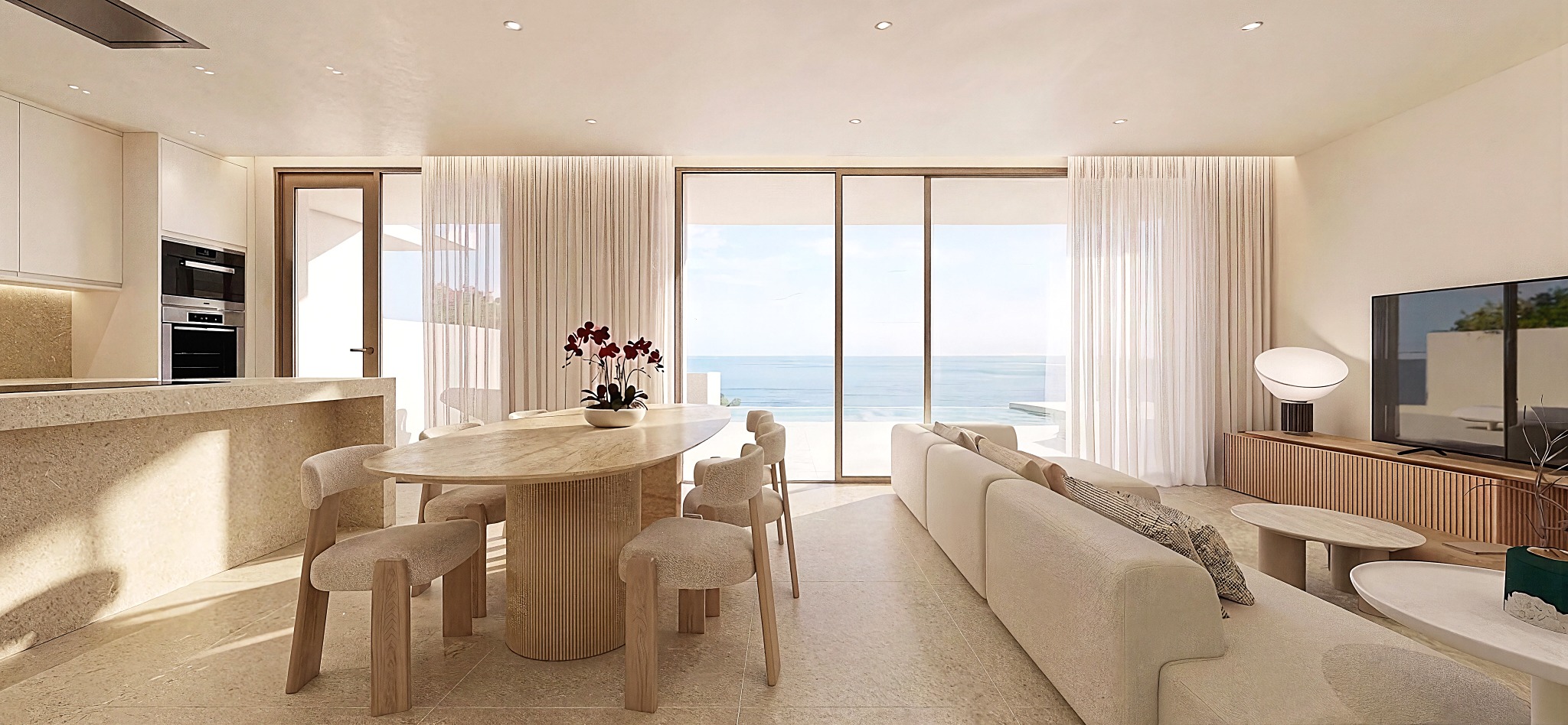 Salón-comedor abierto a la terraza y al Mediterráneo